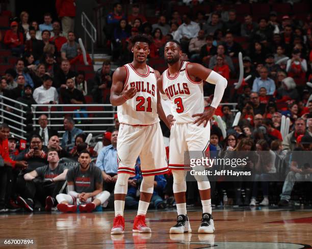 Jimmy Butler and Dwyane Wade of the Chicago Bulls talk during a game against the Orlando Magic on April 10, 2017 at the United Center in Chicago,...