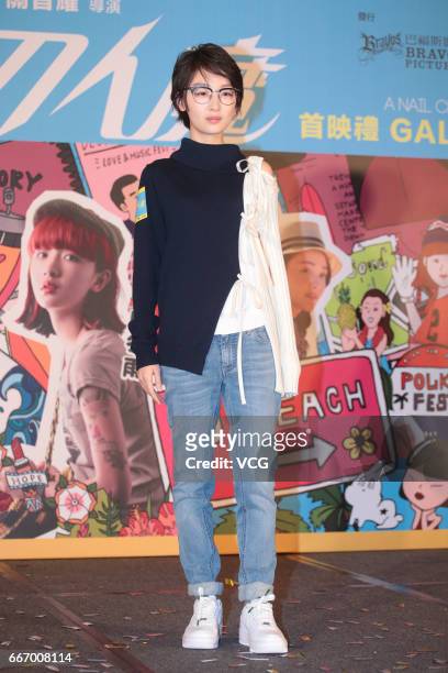 Actress Zhou Dongyu attends the premiere of director Jason Kwan Chi-Yiu's film 'A Nail Clipper Romance' on April 10, 2017 in Hong Kong, China.