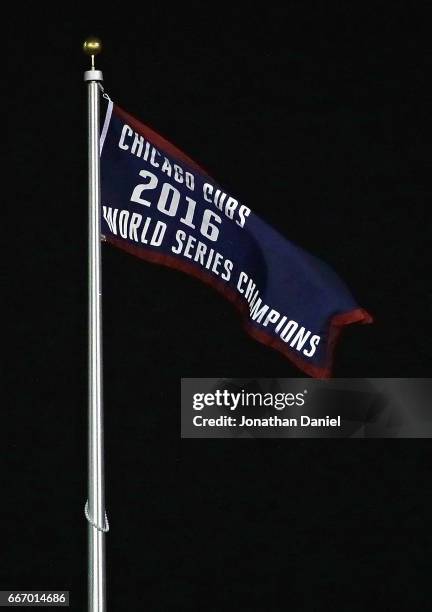 The World Series Championship banner is seen before the home opening game between the Chicago Cubs and the Los Angeles Dodgers at Wrigley Field on...