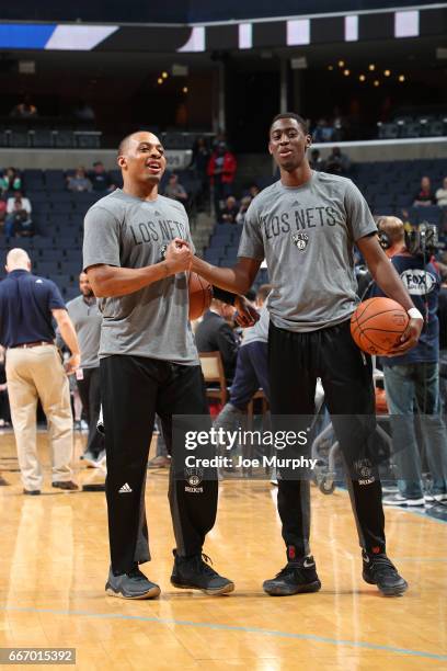 Randy Foye and Andrew Nicholson of the Brooklyn Nets shakes hands before the game against the Memphis Grizzlies on March 6, 2017 at FedExForum in...