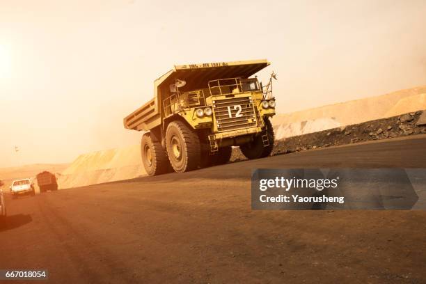 heavy mining truck driving on the mining site,pingshuo china - dump truck stock pictures, royalty-free photos & images