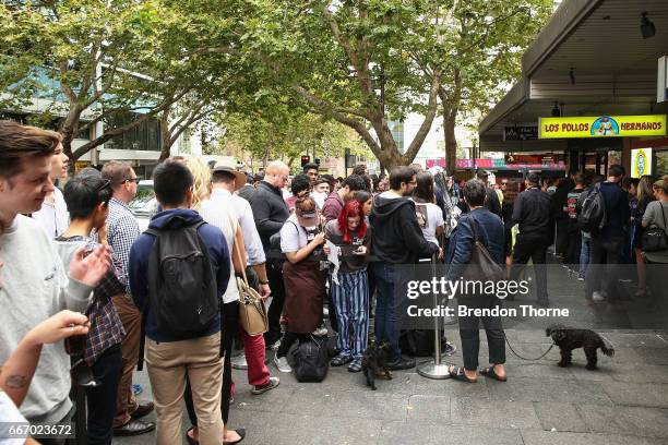 People queue at the Los Pollos Hermanos pop up restaurant on April 11, 2017 in Sydney, Australia. The fictional chicken shop featured in the TV...