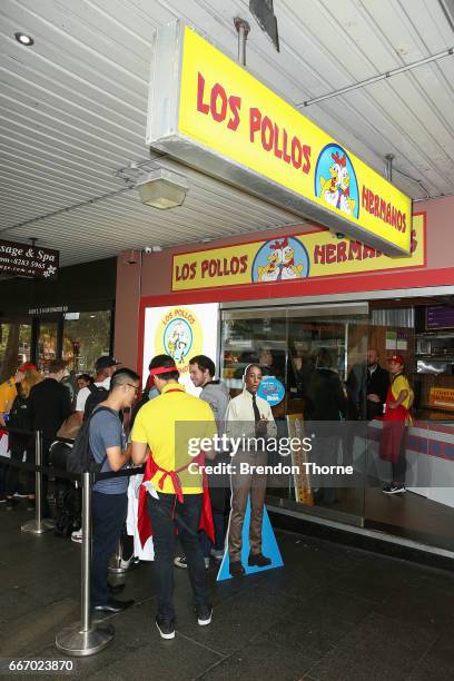 People queue at the Los Pollos Hermanos pop up restaurant on April 11, 2017 in Sydney, Australia. The fictional chicken shop featured in the TV...