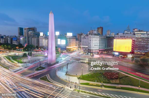 argentina buenos aires rush hour center with obelisco at night - obelisco stock pictures, royalty-free photos & images