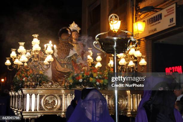 Followers of the Catholic religion during the procession of the Nazarene and Conversion of Santa Maria Magdalema at the beginning of the nine nights...