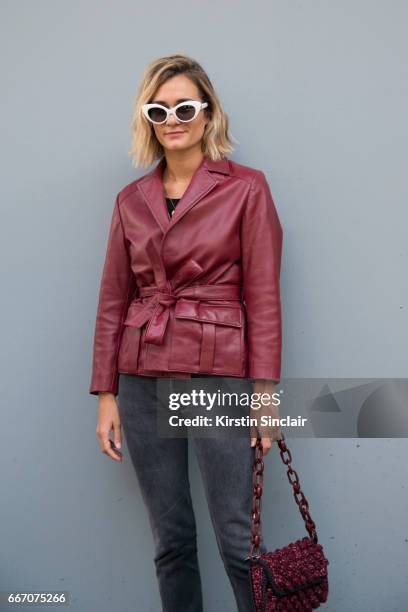 Fashion blogger Anne-Laure Mais, Adenorah wears a Ganni jacket, Levis jeans, vintage sunglasses on day 4 of London Womens Fashion Week Autumn/Winter...