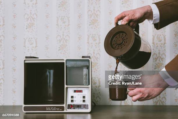 man pouring coffee in retro style - 1980 2017 stock pictures, royalty-free photos & images