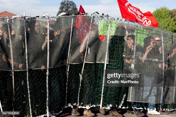 Demonstrators clash with riot police in Lucca, Italy, on April 10, 2017 during a demonstration against G7 Foreign Minister Meeting in Lucca on April...