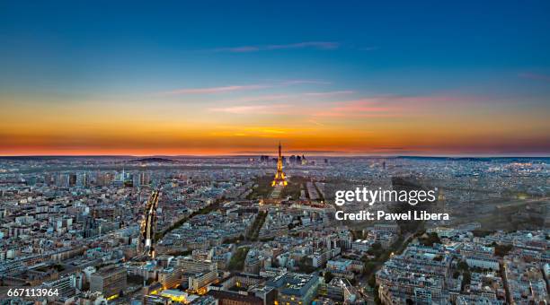 paris skyline with eiffel tower after sunset. - paris france skyline stock pictures, royalty-free photos & images