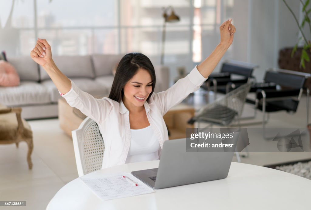 Successful woman working online at home