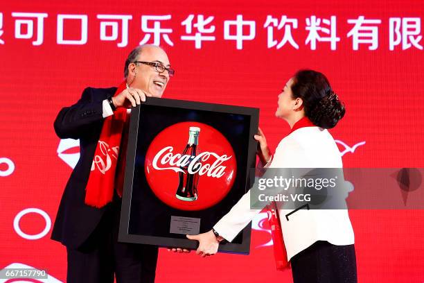 Chairman and chief executive officer of Coca-Cola Muhtar Kent attends a ceremony to announce the World's largest soft drink company Coca-Cola Co...