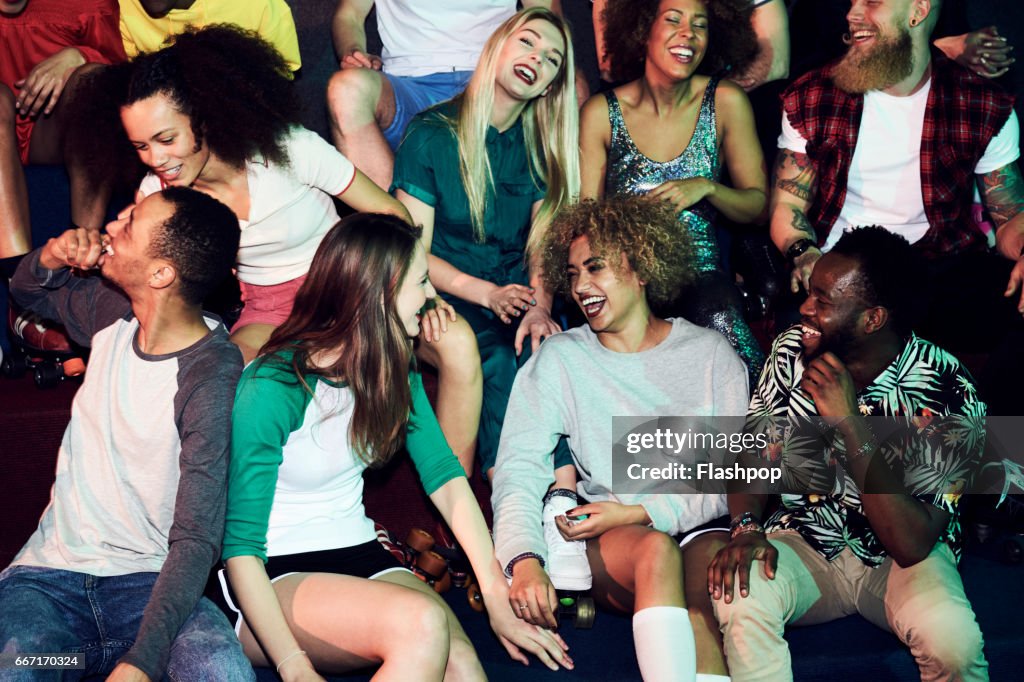 Group of friends having fun on evening out