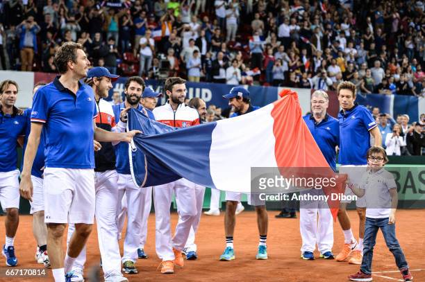 Team of France celebrates the victory during the Davis Cup match, quarter final, between France and Great Britain on April 8, 2017 at Kindarena in...
