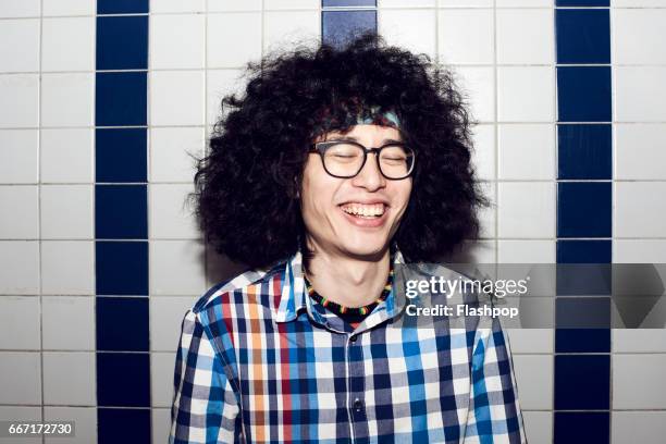 man having fun on evening out - bad hair fotografías e imágenes de stock