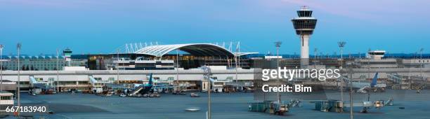 munich airport at sunset, germany - munich airport stock pictures, royalty-free photos & images