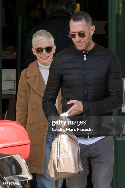 Actress Michelle Williams and hair stylist Chris McMillan are seen leaving the 'Jacquemart Andre' museum on April 11, 2017 in Paris, France.