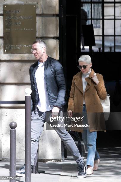 Actress Michelle Williams and hair stylist Chris McMillan are seen leaving the 'Jacquemart Andre' museum on April 11, 2017 in Paris, France.