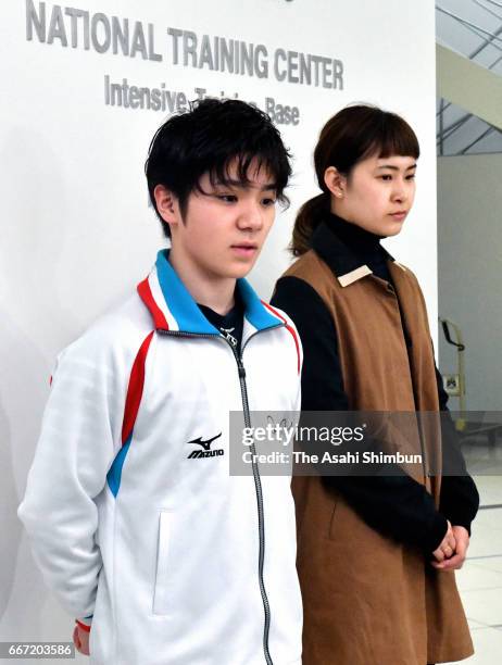Figure skaters Shoma Uno and Kanako Murakami speak to media reporters after figure skater Mao Asada announced her retirement on April 11, 2017 in...