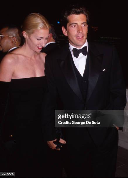 John F. Kennedy, Jr., with his wife Carolyn attend a function in honor of his mother, Jacqueline Kennedy, October 4 at Grand Central Station in New...