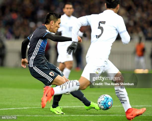 Yuya Kubo of Japan scores his side's third goal during the 2018 FIFA World Cup Qualifier match between Japan and Thailand at Saitama Stadium on March...