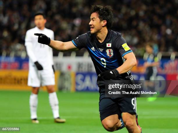 Shinji Okazaki of Japan celebrates scoring his side's second goal during the 2018 FIFA World Cup Qualifier match between Japan and Thailand at...
