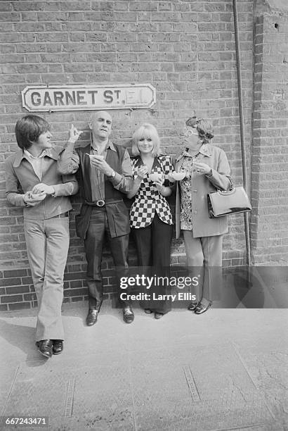 The location filming of a new Alf Garnett film, 'The Alf Garnett Saga', in Garnet Street, London, UK, 17th September 1971. From left to right, actors...