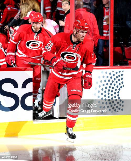 Bryan Bickell of the Carolina Hurricanes enters the ice during introductions prior to an NHL game against the St. Louis Blues on April 8, 2017 at PNC...
