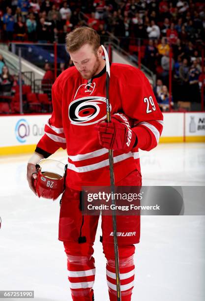 Bryan Bickell of the Carolina Hurricanes is photographed during the national anthem prior to an NHL game against the St. Louis Blues on April 8, 2017...