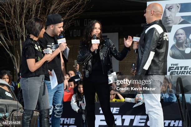 Birmania Rios and William Valdes speak to Michelle Rodriguez and Vin Diesel as they visit Washington Heights on behalf of "The Fate Of The Furious"...