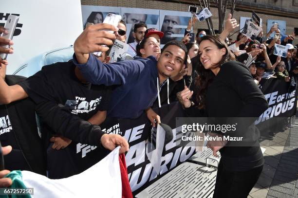 Vin Diesel and Michelle Rodriguez visit Washington Heights on behalf of "The Fate Of The Furious" on April 11, 2017 in New York City.