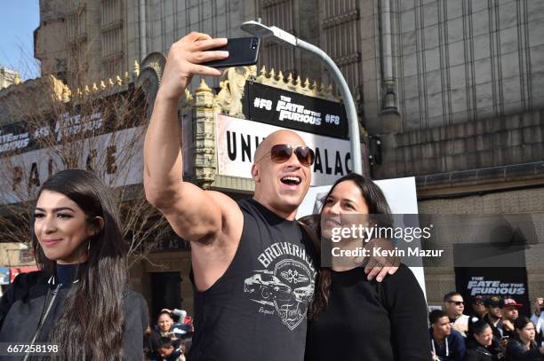 Vin Diesel and Michelle Rodriguez visit Washington Heights on behalf of "The Fate Of The Furious" on April 11, 2017 in New York City.