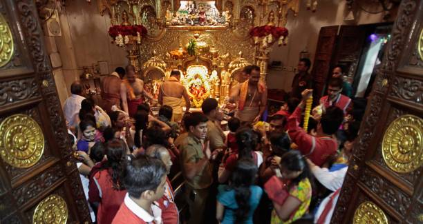 Devotees flock the Siddhivinayak Temple at Prabhadevi, Mumbai, India.