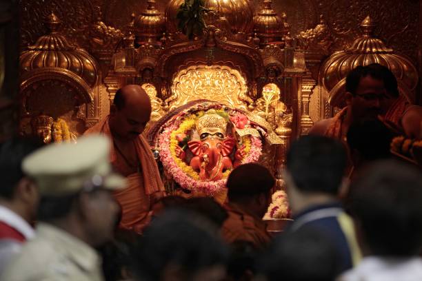Devotees flock the Siddhivinayak Temple at Prabhadevi, Mumbai, India.