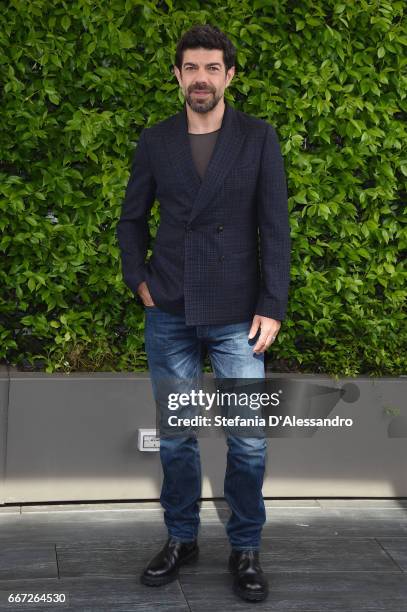 Actor Pierfrancesco Favino attends a photocall for 'Moglie E Marito' on April 11, 2017 in Milan, Italy.