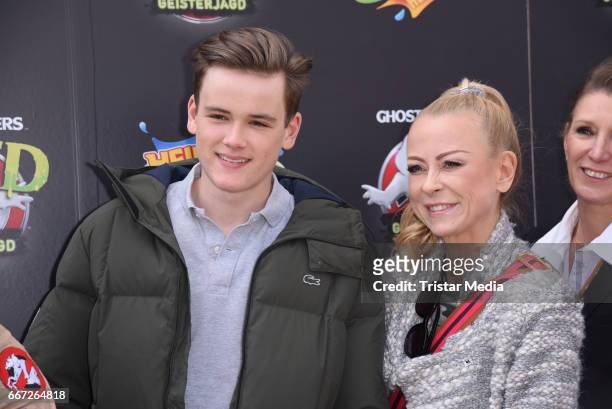 Jenny Elvers and her son Paul Jolig attend the 'Ghostbusters 5D' opening at Heidepark on April 11, 2017 in Soltau, Germany.
