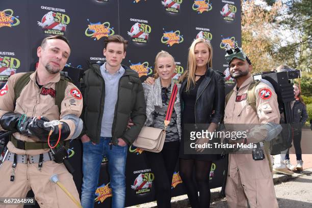 Jenny Elvers, her son Paul Jolig and Alena Gerber attend the 'Ghostbusters 5D' opening at Heidepark on April 11, 2017 in Soltau, Germany.