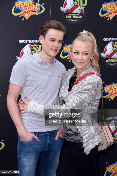 Jenny Elvers and her son Paul Jolig attend the 'Ghostbusters 5D' opening at Heidepark on April 11, 2017 in Soltau, Germany.