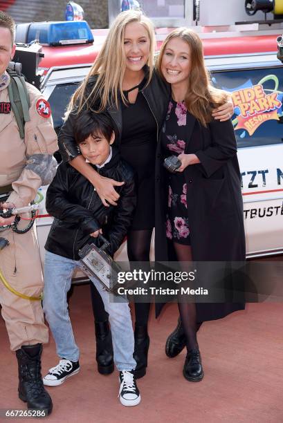 Alena Gerber with her sister Deborah Gerber and brother Mario Gerber attend the 'Ghostbusters 5D' opening at Heidepark on April 11, 2017 in Soltau,...