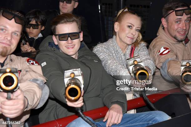 Jenny Elvers and her son Paul Jolig attend the 'Ghostbusters 5D' opening at Heidepark on April 11, 2017 in Soltau, Germany.