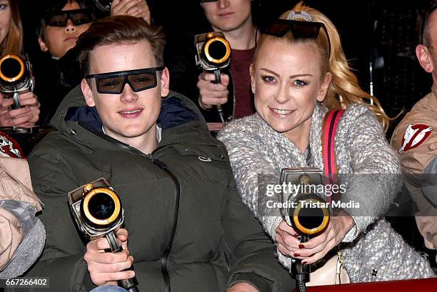 Jenny Elvers and her son Paul Jolig attend the 'Ghostbusters 5D' opening at Heidepark on April 11, 2017 in Soltau, Germany.