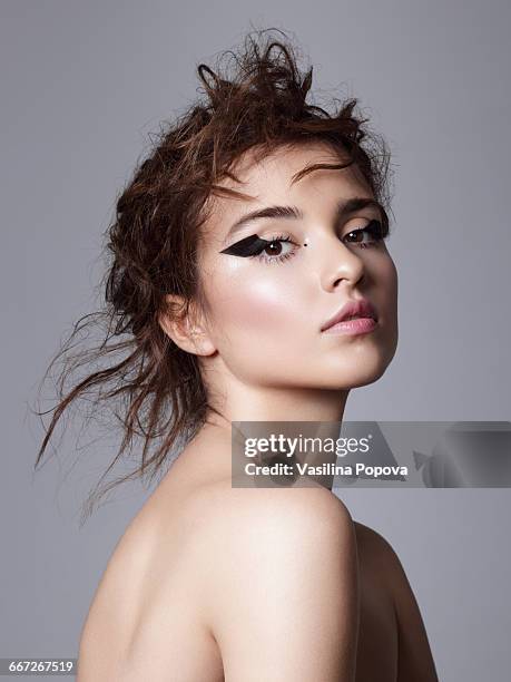 young beautiful woman - eyeliner stock-fotos und bilder