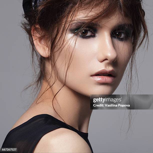 young beautiful woman - smokey eyeshadow stock pictures, royalty-free photos & images