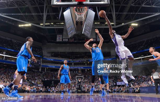 Tyreke Evans of the Sacramento Kings shoots a layup against AJ Hammons of the Dallas Mavericks on April 4, 2017 at Golden 1 Center in Sacramento,...