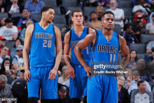 Hammons, Dwight Powell and Yogi Ferrell of the Dallas Mavericks look on during the game against the Sacramento Kings on April 4, 2017 at Golden 1...