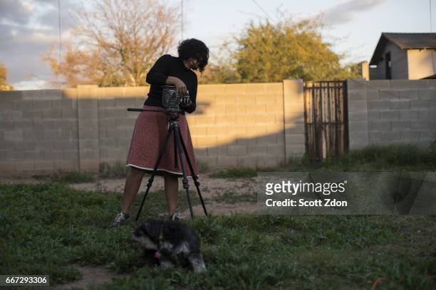camera operator and director in backyard - scott zdon stock-fotos und bilder