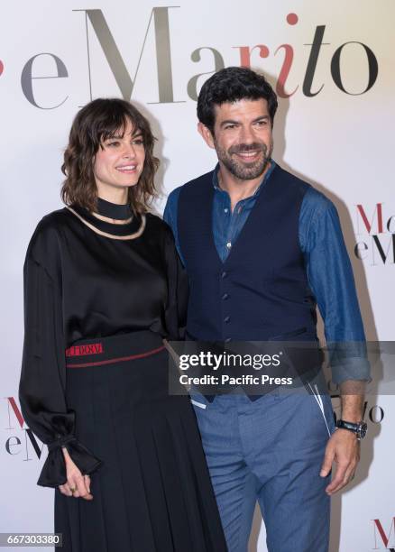 Kasia Smutniak and Pierfrancesco Favino attends a photocall for "Moglie E Marito".