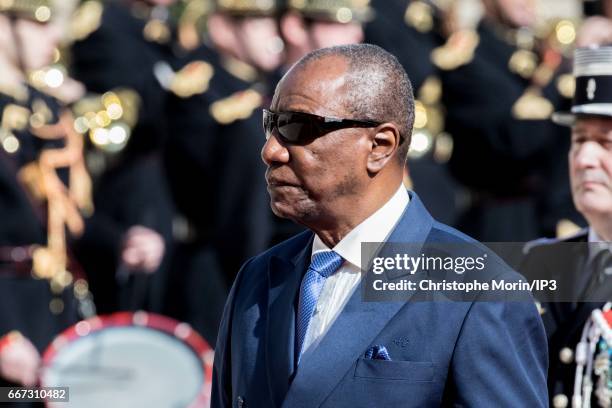 French President Francois Hollande welcomes President of Guinea Alpha Conde for a meeting at the Elysee Palace on April 11, 2017 in Paris, France....