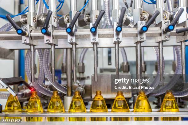 Multinational cosmetics company headquartered in France L`Oreal plant in Rio de Janeiro, Brazil - Production line - automation - machine fills up...