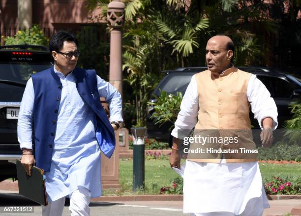 Union Home Minister Rajnath Singh talking to Minister of Home Affairs Kiren Rijiju after attending the BJP Parliamentary Party Meeting at Parliament...