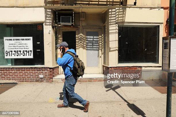 Empty store fronts stand in a trendy West Village neighborhood on April 11, 2017 in New York City. Many residents and tourists alike are noticing an...